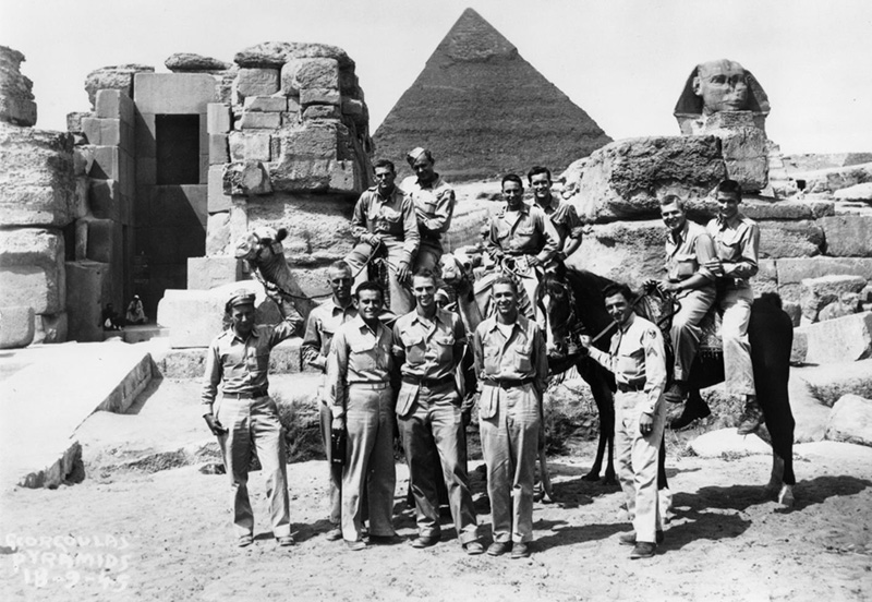 Justice Rehnquist, far right, seated on the camel